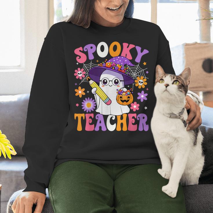 Trick Or Teach Spooky Teacher Ghost Halloween Teacher Women Crewneck Sweatshirt, gift for family, gift for coworker Trick Or Teach Spooky Teacher Ghost Halloween Teacher Women Crewneck Sweatshirt, gift for family, gift for coworker