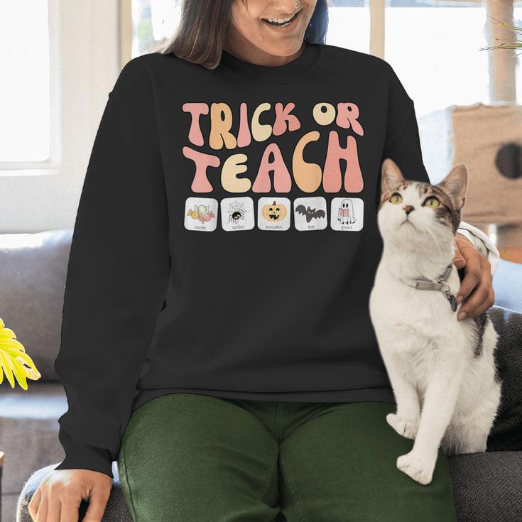Trick Or Teach With Symbols Special Education Teacher Spooky Women Crewneck Sweatshirt, gift for family, gift for coworker