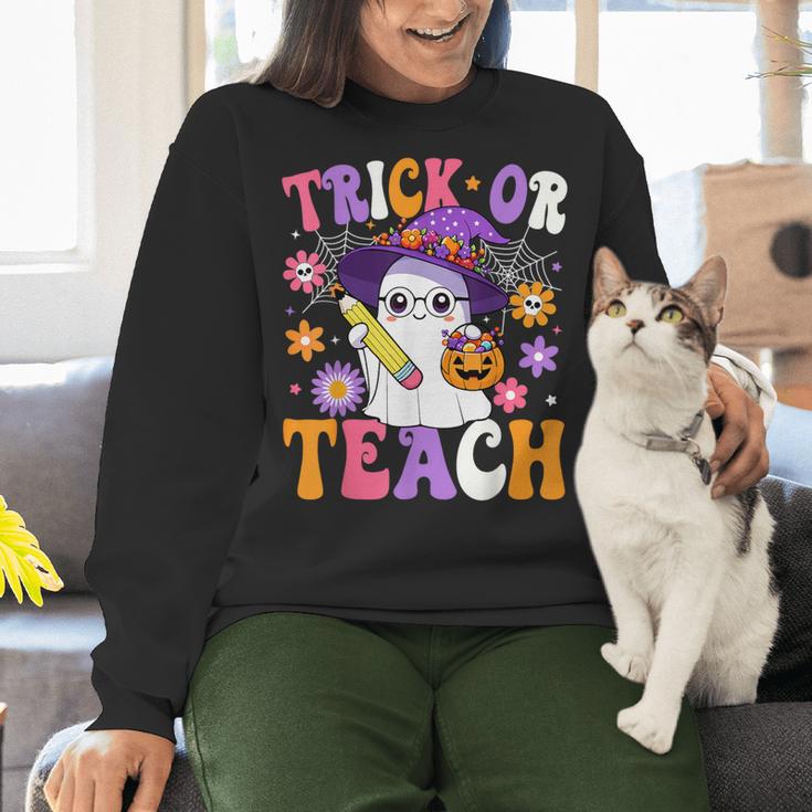 Trick Or Teach Teacher Ghost Teaching Fun Halloween Teacher Women Crewneck Sweatshirt, gift for family, gift for coworker Trick Or Teach Teacher Ghost Teaching Fun Halloween Teacher Women Crewneck Sweatshirt, gift for family, gift for coworker