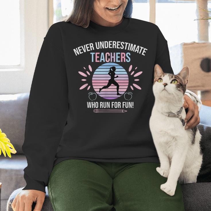 Never Underestimate Teachers Who Runs For Fun Women Crewneck Sweatshirt, gift for family, gift for coworker Never Underestimate Teachers Who Runs For Fun Women Crewneck Sweatshirt, gift for family, gift for coworker