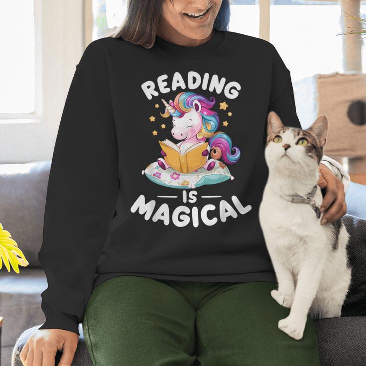 Unicorn Teacher Reading Is Magical Book Women Crewneck Sweatshirt, gift for family, gift for coworker Unicorn Teacher Reading Is Magical Book Women Crewneck Sweatshirt, gift for family, gift for coworker