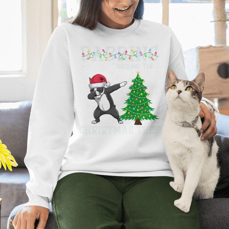 Boston Terrier Santa Hat Dabbing Around The Christmas Tree Women Crewneck Sweatshirt, Boston Terrier Christmas Sweatshirts, gift for family, gift for coworker
