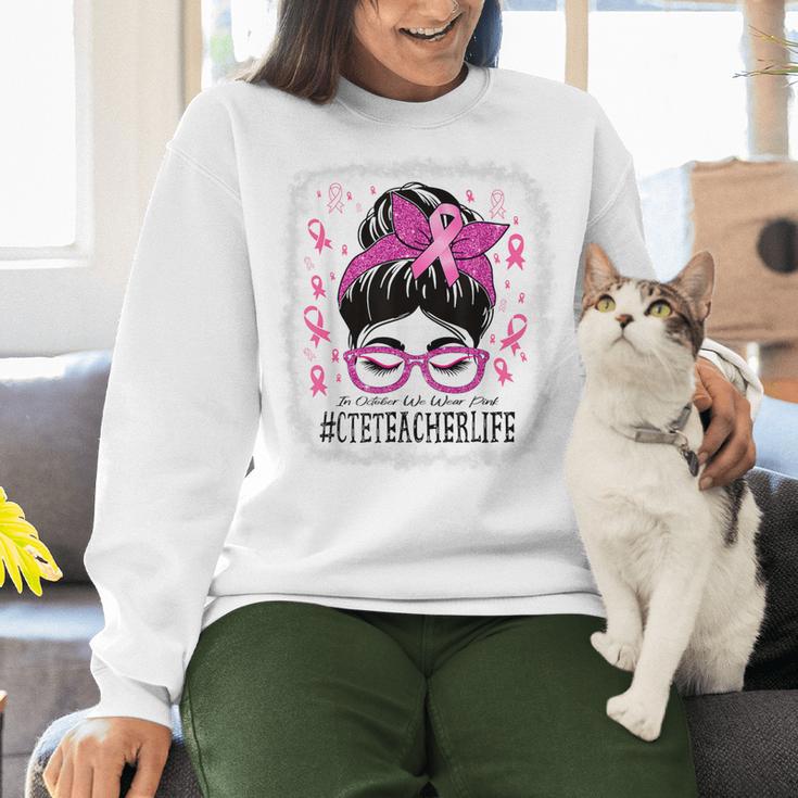 CTE Teacher In October We Wear Pink Breast Cancer Awareness Women Crewneck Sweatshirt, gift for family, gift for coworker CTE Teacher In October We Wear Pink Breast Cancer Awareness Women Crewneck Sweatshirt, gift for family, gift for coworker