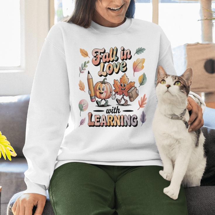 Fall In Love With Learning Teacher Autumn School Women Crewneck Sweatshirt, gift for family, gift for coworker Fall In Love With Learning Teacher Autumn School Women Crewneck Sweatshirt, gift for family, gift for coworker