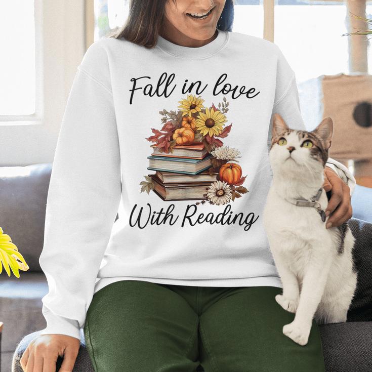 Fall In Love With Reading Book Autumn Teachers Pumpkins Women Crewneck Sweatshirt, gift for family, gift for coworker Fall In Love With Reading Book Autumn Teachers Pumpkins Women Crewneck Sweatshirt, gift for family, gift for coworker