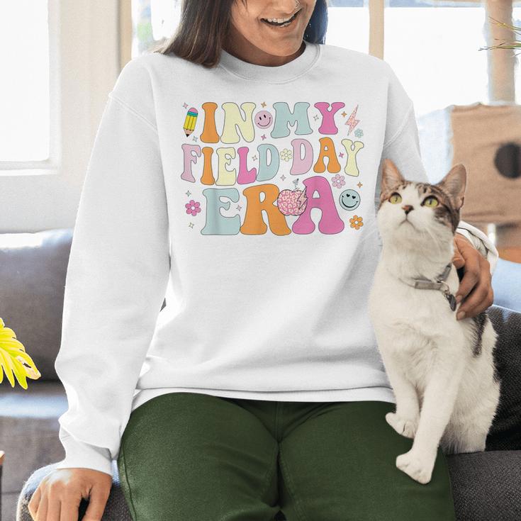 In My Field Day Era Teacher Kids Cute Groovy Field Day Women Crewneck Sweatshirt, Groovy Teacher Sweatshirts, gift for family, gift for coworker In My Field Day Era Teacher Kids Cute Groovy Field Day Women Crewneck Sweatshirt, Groovy Teacher Sweatshirts, gift for family, gift for coworker