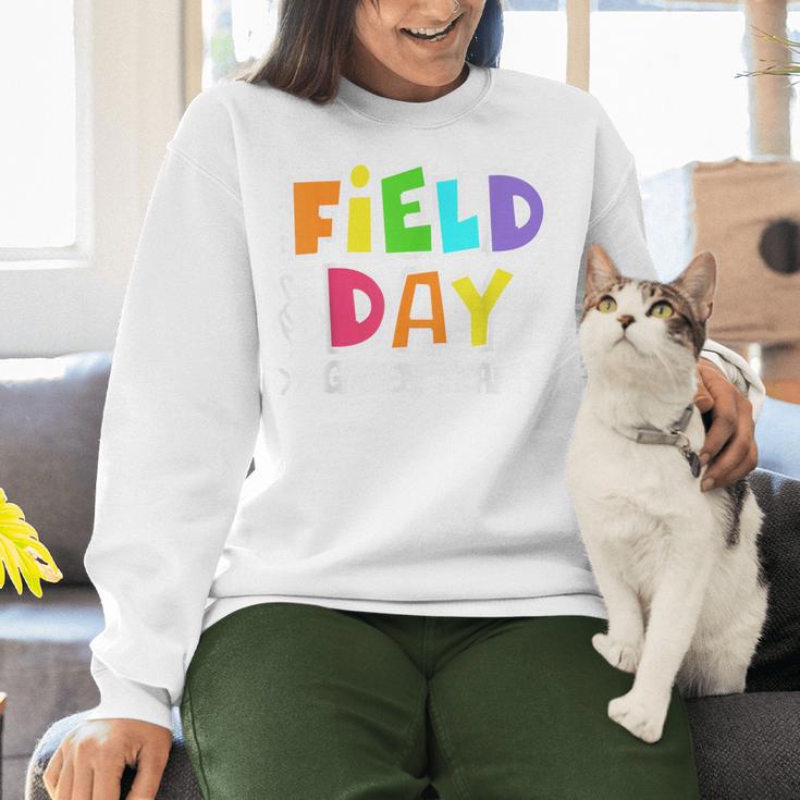 Field Day Green Team For Teacher Kids Field Day Games Women Crewneck Sweatshirt, gift for family, gift for coworker Field Day Green Team For Teacher Kids Field Day Games Women Crewneck Sweatshirt, gift for family, gift for coworker