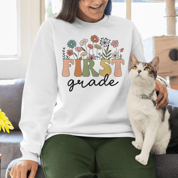First Grade Teacher Wildflower Back To School Floral Outfits Women Crewneck Sweatshirt, First Grade Teacher Sweatshirts, gift for family, gift for coworker First Grade Teacher Wildflower Back To School Floral Outfits Women Crewneck Sweatshirt, First Grade Teacher Sweatshirts, gift for family, gift for coworker