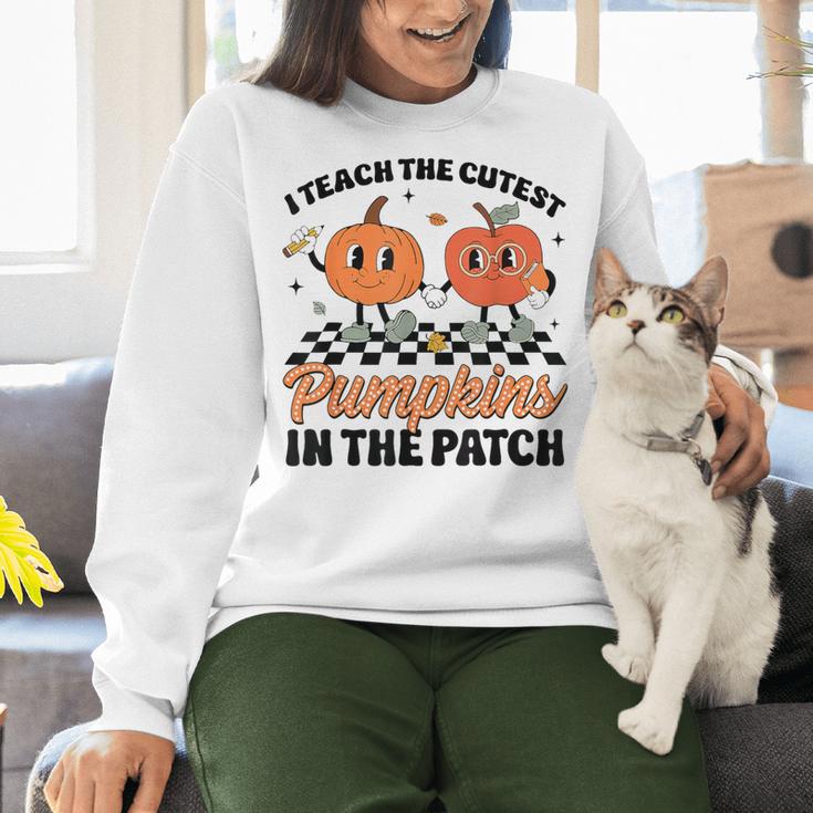 Groovy I Teach The Cutest Pumpkins In The Patch For Teacher Women Crewneck Sweatshirt, Groovy Teacher Sweatshirts, gift for family, gift for coworker