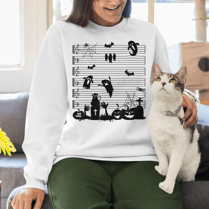 Halloween Music Note Clefs Spooky Ghost For Music Teacher Women Crewneck Sweatshirt, gift for family, gift for coworker