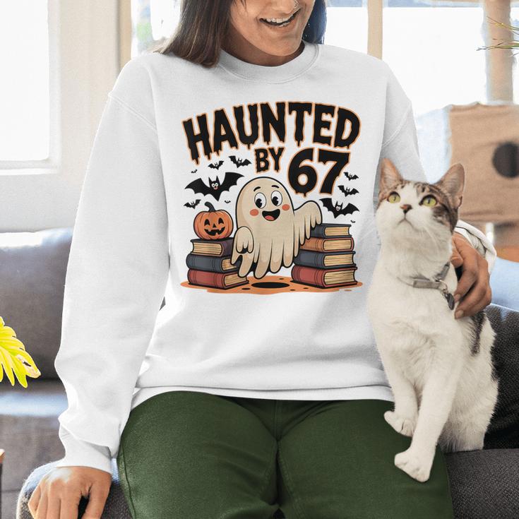 Haunted By 67 Teacher Ghost Pumpkin Halloween Costum Women Crewneck Sweatshirt, gift for family, gift for coworker Haunted By 67 Teacher Ghost Pumpkin Halloween Costum Women Crewneck Sweatshirt, gift for family, gift for coworker