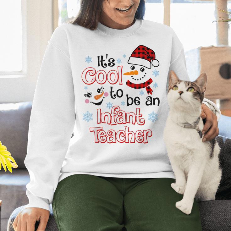 It's Cool To Be a Infant Teacher Snowman Winter Christmas Women Crewneck Sweatshirt, gift for family, gift for coworker It's Cool To Be a Infant Teacher Snowman Winter Christmas Women Crewneck Sweatshirt, gift for family, gift for coworker