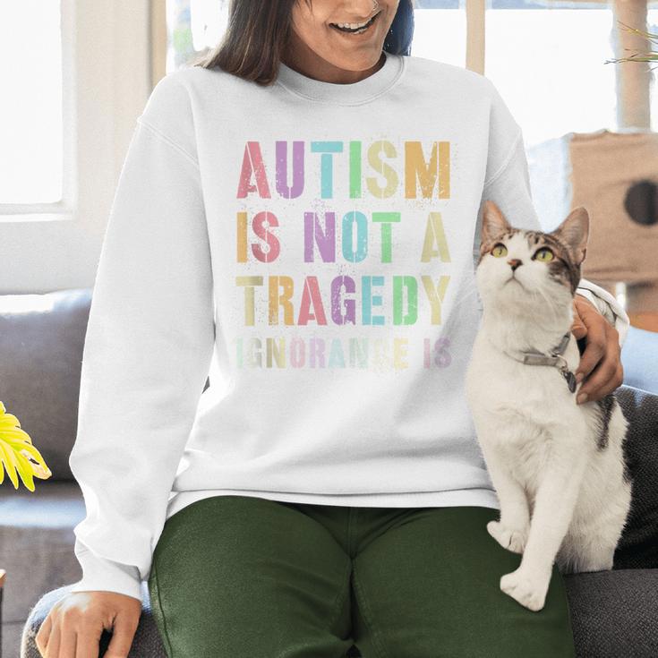 Kids AUTISM IS NOT A TRAGEDY IGNORANCE IS Proud Teacher Crew Women Crewneck Sweatshirt, gift for family, gift for coworker Kids AUTISM IS NOT A TRAGEDY IGNORANCE IS Proud Teacher Crew Women Crewneck Sweatshirt, gift for family, gift for coworker