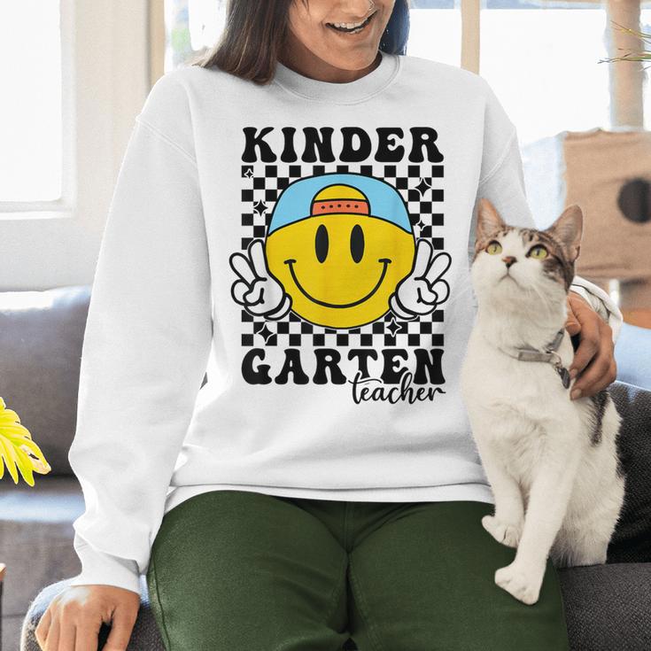 Kindergarten Teacher Hippie Smile Face Back School Women Crewneck Sweatshirt, gift for family, gift for coworker Kindergarten Teacher Hippie Smile Face Back School Women Crewneck Sweatshirt, gift for family, gift for coworker