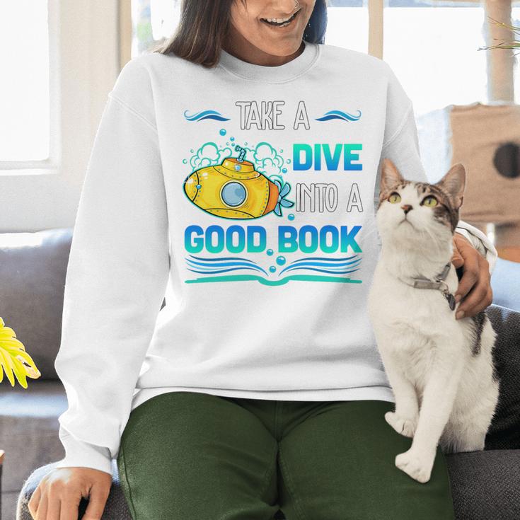 Librarian Teacher Dive Into A Good Book Reading Premium Tri-Blend Women Crewneck Sweatshirt, gift for family, gift for coworker Librarian Teacher Dive Into A Good Book Reading Premium Tri-Blend Women Crewneck Sweatshirt, gift for family, gift for coworker