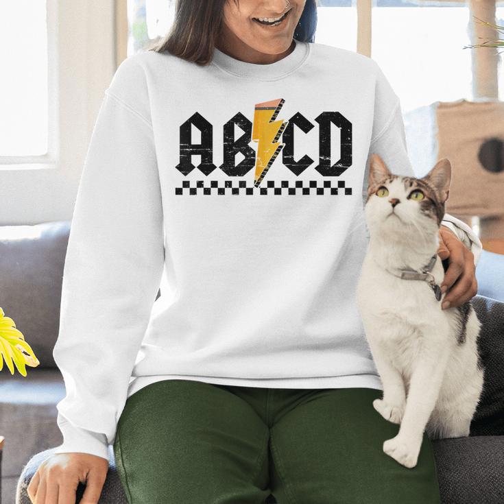 Lightning Pencil Rock'n Roll ABCD Teacher Back To School Kid Women Crewneck Sweatshirt, gift for family, gift for coworker Lightning Pencil Rock'n Roll ABCD Teacher Back To School Kid Women Crewneck Sweatshirt, gift for family, gift for coworker
