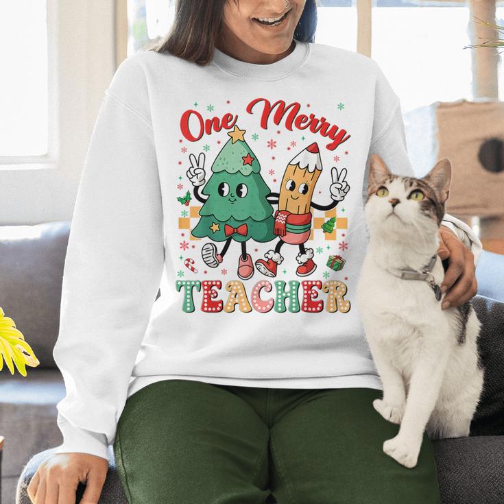 One Merry Teacher Groovy Christmas Tree Pjs Xmas Teacher Women Crewneck Sweatshirt, Groovy Teacher Sweatshirts, gift for family, gift for coworker One Merry Teacher Groovy Christmas Tree Pjs Xmas Teacher Women Crewneck Sweatshirt, Groovy Teacher Sweatshirts, gift for family, gift for coworker