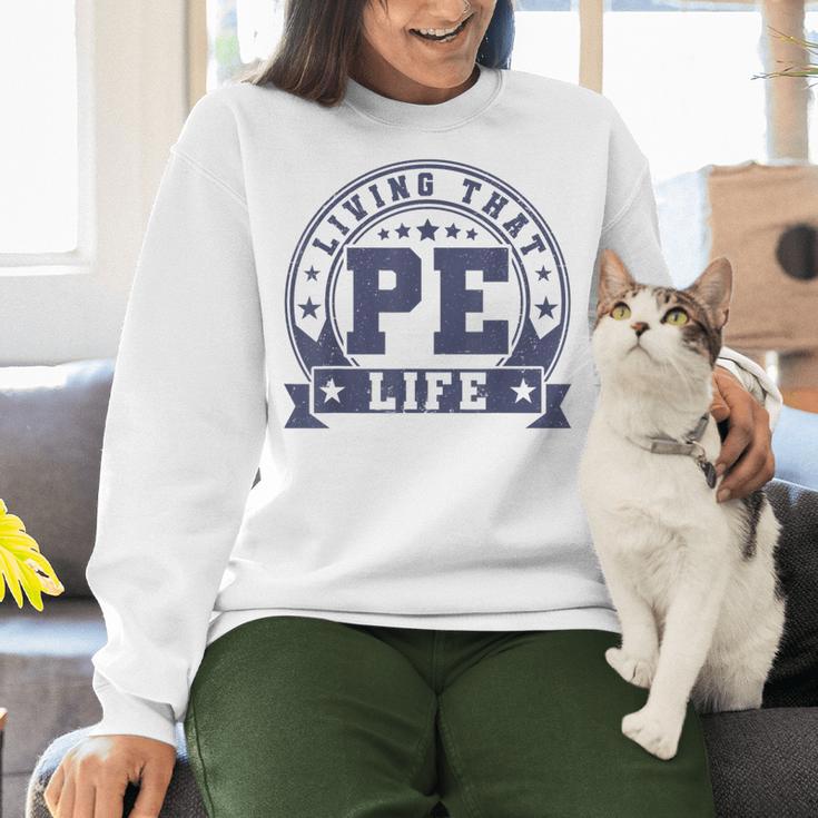 PE Teacher Living That PE Life Physical Education Teacher Women Crewneck Sweatshirt, Pe Teacher Sweatshirts, gift for family, gift for coworker