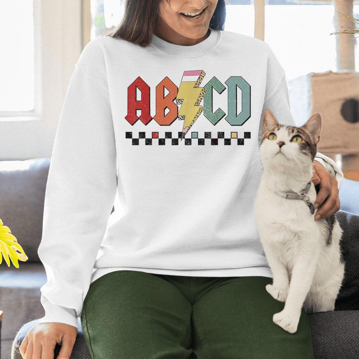 Rock Abcd Back To School Abcd Preschool Teacher Appreciation Women Crewneck Sweatshirt, gift for family, gift for coworker Rock Abcd Back To School Abcd Preschool Teacher Appreciation Women Crewneck Sweatshirt, gift for family, gift for coworker
