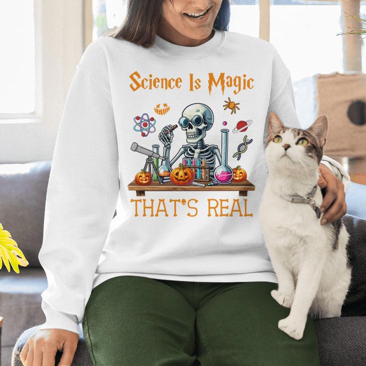 Science Is Magic Halloween Skeleton Students Teacher Women Crewneck Sweatshirt, Science Teacher Sweatshirts, gift for family, gift for coworker