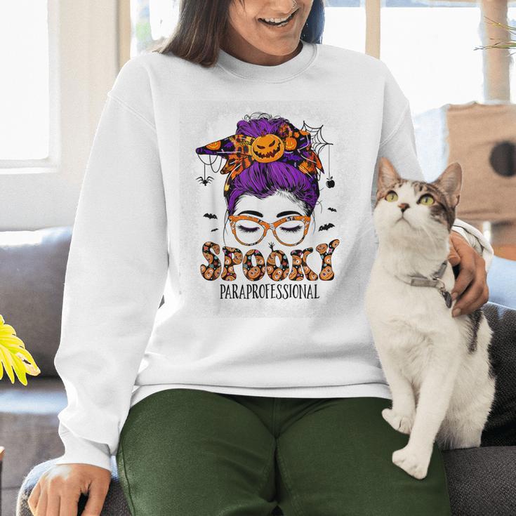 Spooky Paraprofessional Life Halloween Messy Bun Teacher For Men Women Women Crewneck Sweatshirt, gift for family, gift for coworker Spooky Paraprofessional Life Halloween Messy Bun Teacher For Men Women Women Crewneck Sweatshirt, gift for family, gift for coworker