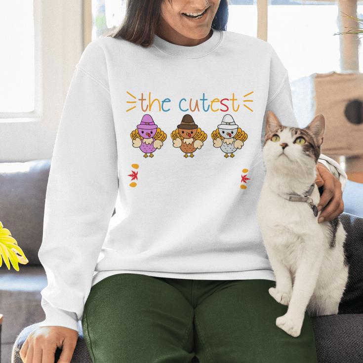 I Teach The Cutest Turkeys School Teachers Thanksgiving Women Crewneck Sweatshirt, gift for family, gift for coworker I Teach The Cutest Turkeys School Teachers Thanksgiving Women Crewneck Sweatshirt, gift for family, gift for coworker