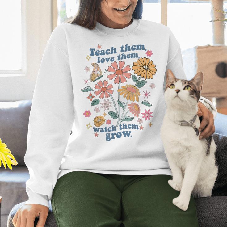 Teach Them Love Them Watch Them Grow Retro Teacher Floral Women Crewneck Sweatshirt, gift for family, gift for coworker