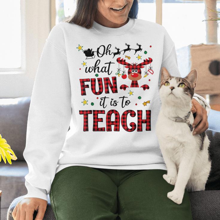 Teachers Oh What Fun It Is To Teach Cute Red Plaid Reindeer Women Crewneck Sweatshirt, gift for family, gift for coworker Teachers Oh What Fun It Is To Teach Cute Red Plaid Reindeer Women Crewneck Sweatshirt, gift for family, gift for coworker