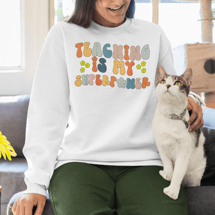 Teaching Is My Superpower Vintage Groovy University Teacher Women Crewneck Sweatshirt, Groovy Teacher Sweatshirts, gift for family, gift for coworker Teaching Is My Superpower Vintage Groovy University Teacher Women Crewneck Sweatshirt, Groovy Teacher Sweatshirts, gift for family, gift for coworker