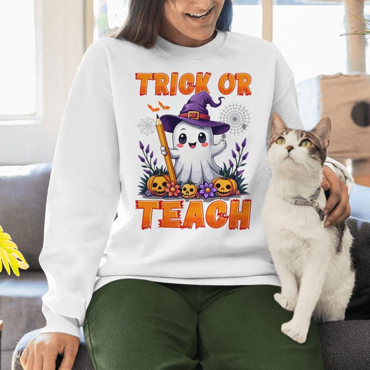 Trick Or Teach Teacher Halloween Ghost Pencil Floral Women Crewneck Sweatshirt, gift for family, gift for coworker