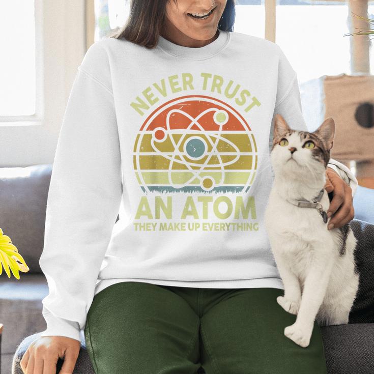 Never Trust An Atom Physics Jokes Science Teacher Women Crewneck Sweatshirt, Science Teacher Sweatshirts, gift for family, gift for coworker Never Trust An Atom Physics Jokes Science Teacher Women Crewneck Sweatshirt, Science Teacher Sweatshirts, gift for family, gift for coworker