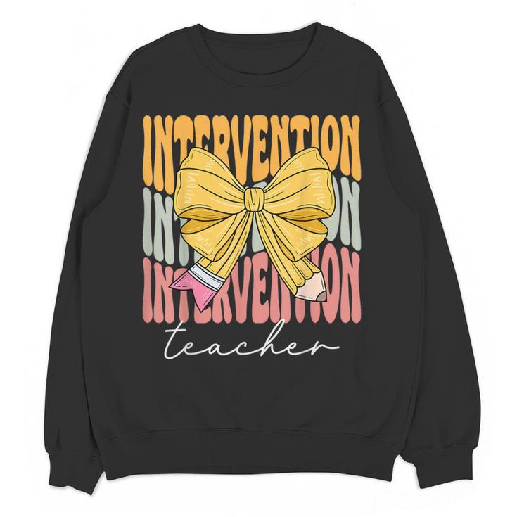 Interventionist Teacher Groovy Coquette Bow Back To School Women Crewneck Sweatshirt, novelty gifts, funny gifts