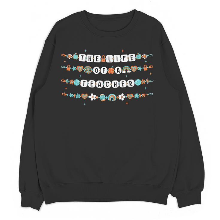 The Life Of A Teacher Friendship Bracelets Elementary School Women Crewneck Sweatshirt, novelty gifts, funny gifts