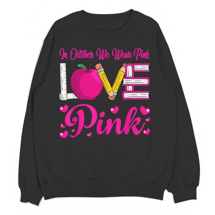 In October We Wear Pink Love Teacher Breast Cancer Awareness Women Crewneck Sweatshirt, novelty gifts, funny gifts