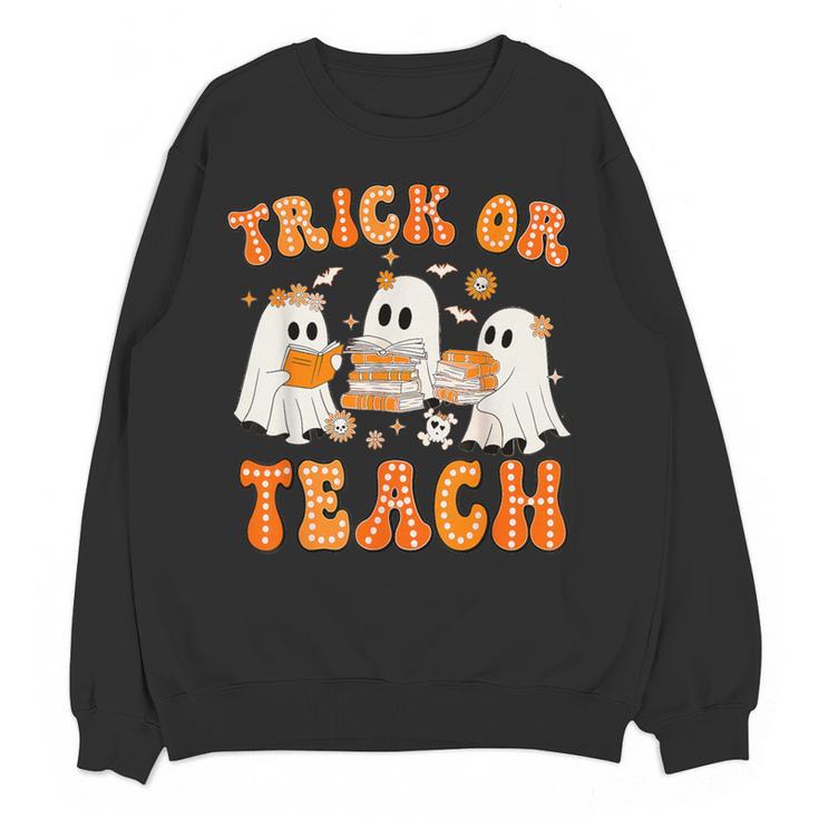 Teacher Halloween Trick Or Teach Retro Groovy Floral Ghost Women Crewneck Sweatshirt, novelty gifts, funny gifts Teacher Halloween Trick Or Teach Retro Groovy Floral Ghost Women Crewneck Sweatshirt, novelty gifts, funny gifts