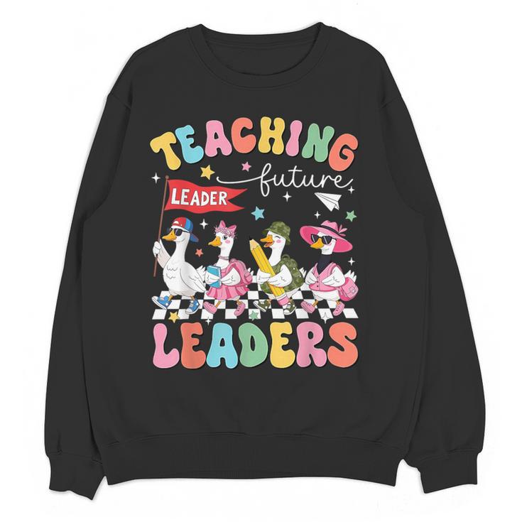 Teaching Future Leaders Groovy Teacher Back To School Women Crewneck Sweatshirt, novelty gifts, funny gifts Teaching Future Leaders Groovy Teacher Back To School Women Crewneck Sweatshirt, novelty gifts, funny gifts