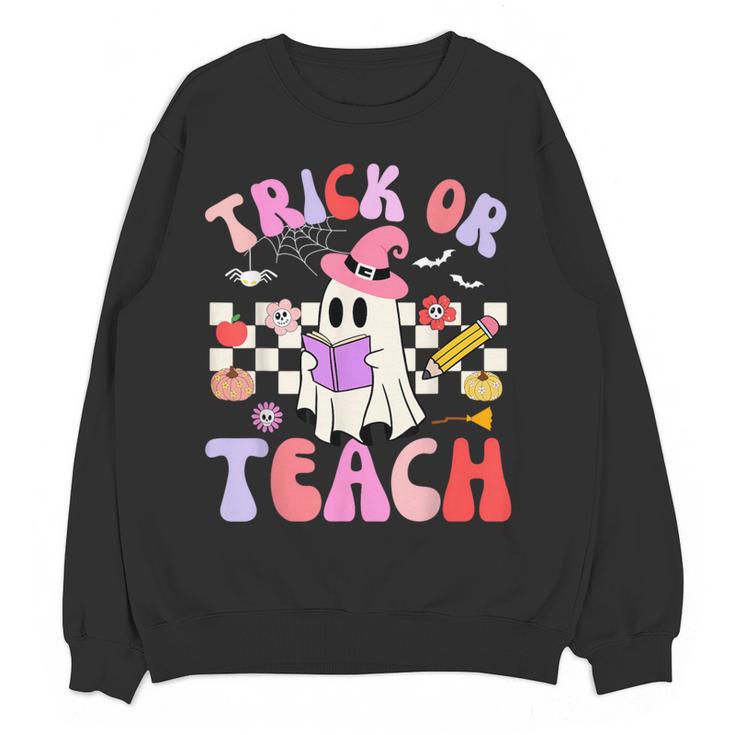 Trick Or Teach Halloween Teacher Floral Ghost Groovy Women Crewneck Sweatshirt, novelty gifts, funny gifts Trick Or Teach Halloween Teacher Floral Ghost Groovy Women Crewneck Sweatshirt, novelty gifts, funny gifts