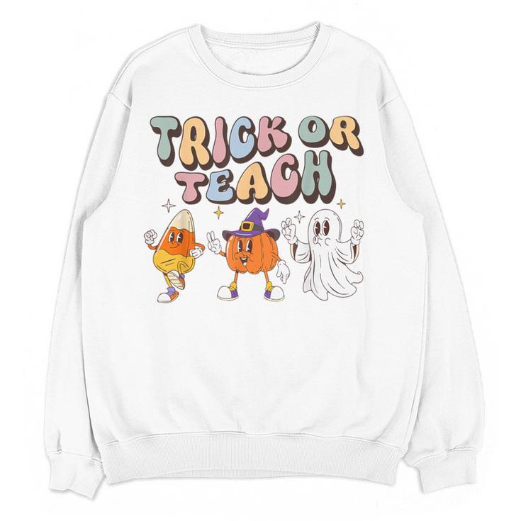 Trick Or Teach Candy Corn Pumpkin Ghost Teacher Women Crewneck Sweatshirt, novelty gifts, funny gifts