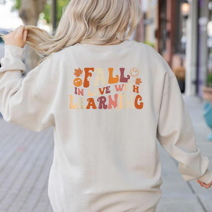 Fall In Love With Learning Autum Thanksgiving Teacher Kids Women's Sweatshirt Back Print