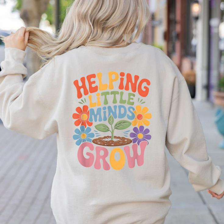 Helping Little Minds Grow Teacher First Day Back To School Women's Sweatshirt Back Print