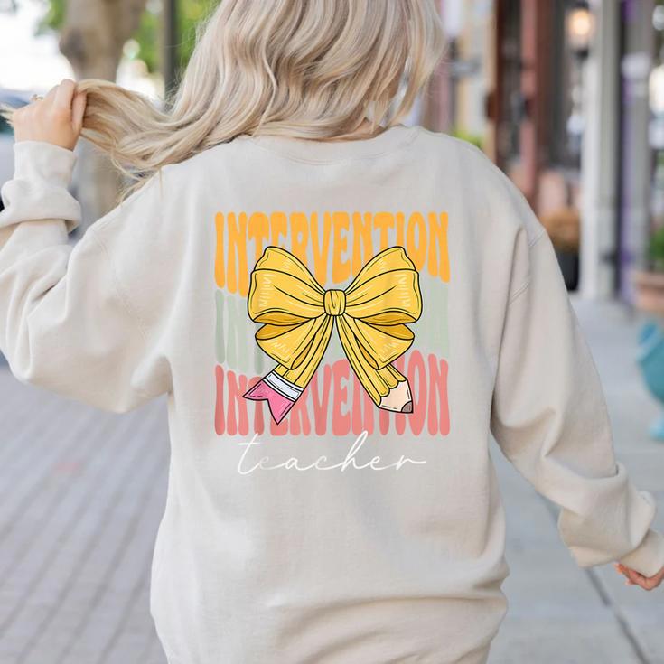 Interventionist Teacher Groovy Coquette Bow Back To School Women's Sweatshirt Back Print