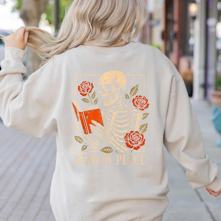 Read In Peace Skeleton Reading Book Halloween Teacher Women's Sweatshirt Back Print