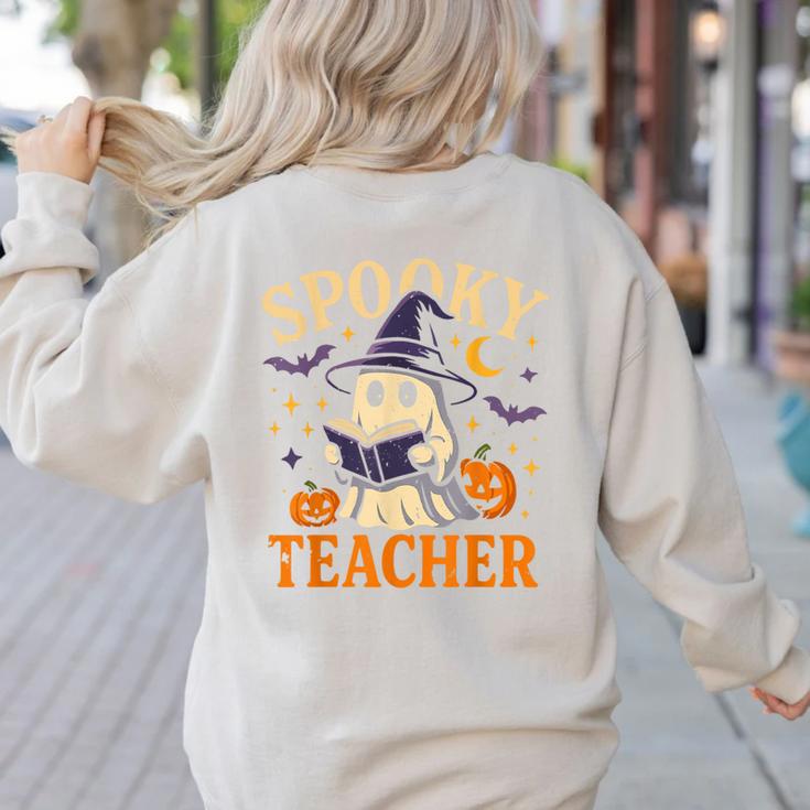 Spooky Teacher Halloween Cute Ghost Pumpkin Reading Women Women's Sweatshirt Back Print