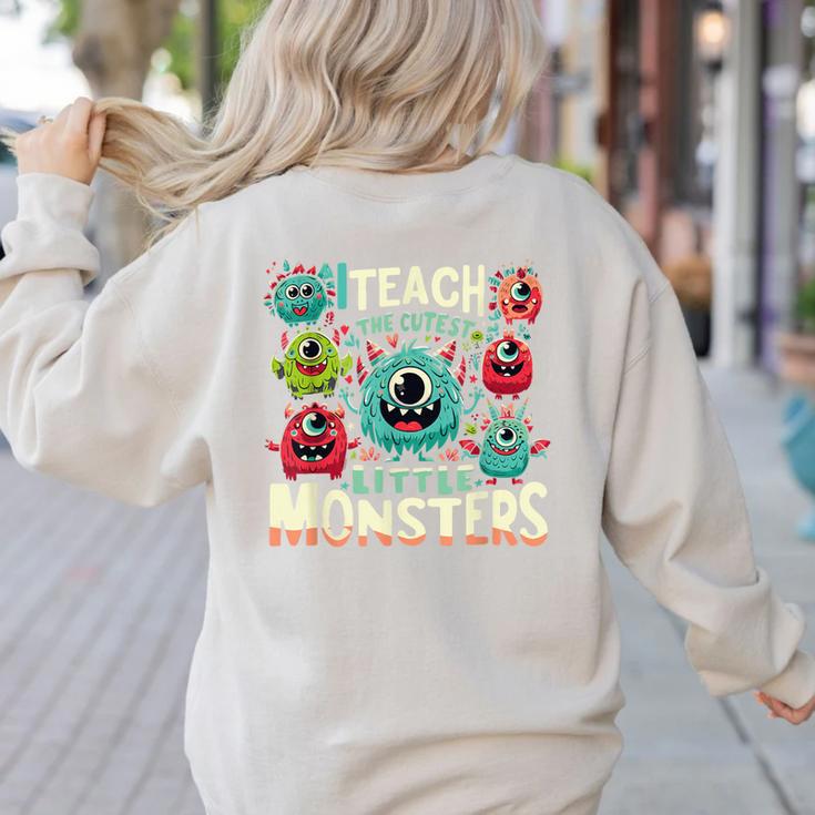 I Teach The Cutest Little Monsters Teacher Halloween Outfit Women's Sweatshirt Back Print
