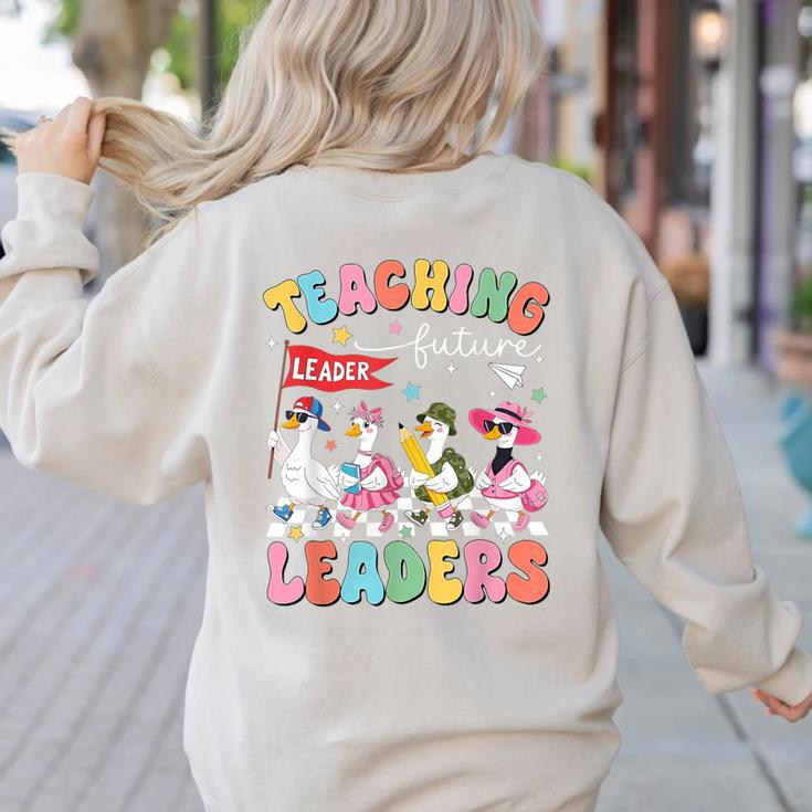 Teaching Future Leaders Groovy Teacher Back To School Women's Sweatshirt Back Print