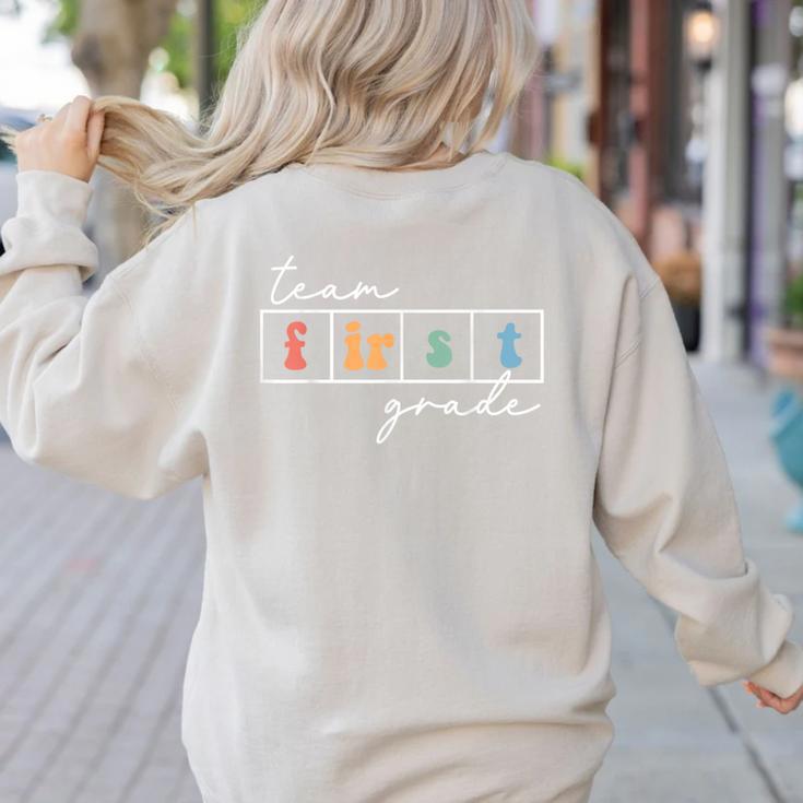 Team First Grade Back To School 1st Grade Teacher Kids Cute Women's Sweatshirt Back Print