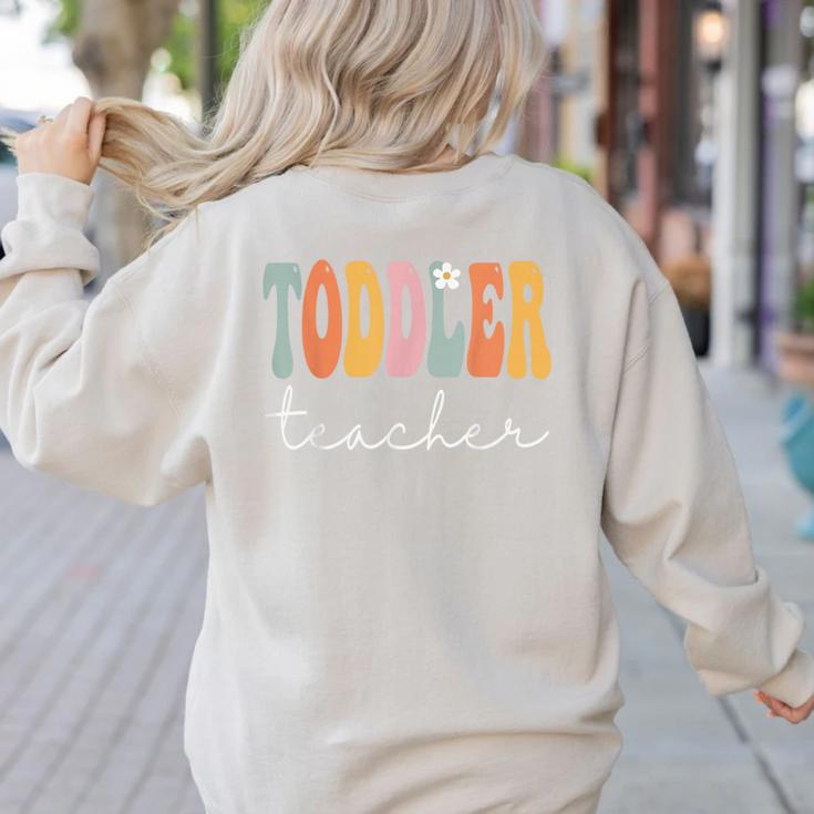 Toddler Teacher Retro Groovy Women Happy First Day Of School Women's Sweatshirt Back Print