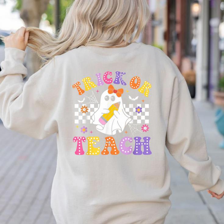 Trick Or Teach Groovy Halloween Teachers Women's Sweatshirt Back Print