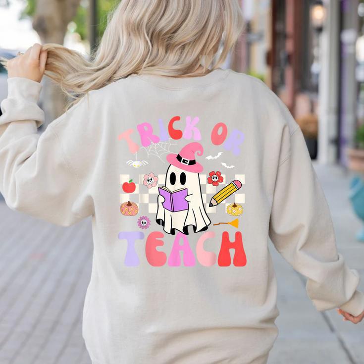 Trick Or Teach Halloween Teacher Floral Ghost Groovy Women's Sweatshirt Back Print