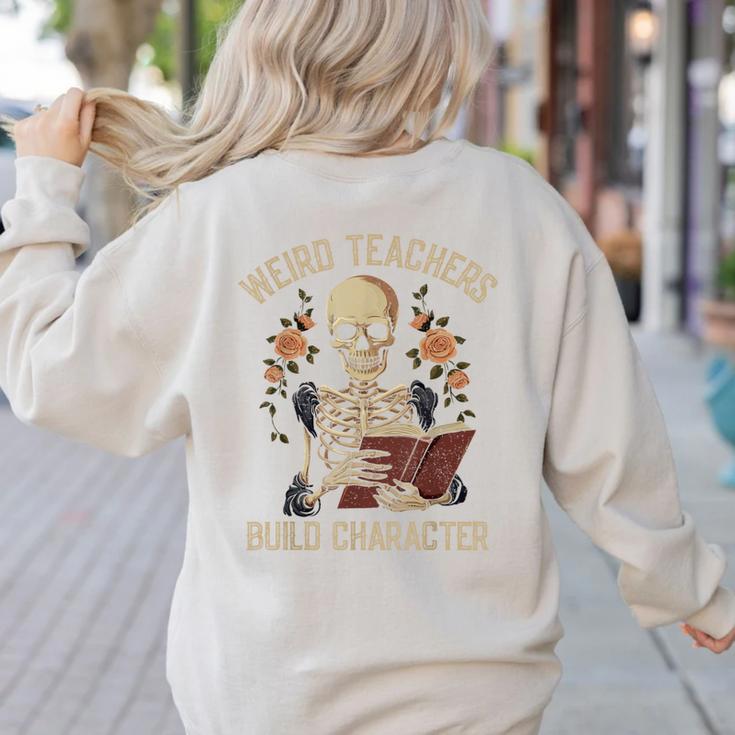 Weird Teachers Build Character Skeleton Book Halloween Women Women's Sweatshirt Back Print